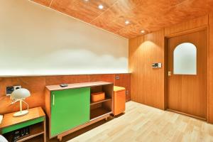Ένα ή περισσότερα κρεβάτια σε δωμάτιο στο Gyeongju Coolstay hotel