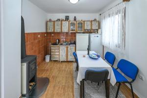 Kuchyň nebo kuchyňský kout v ubytování Tim Apartment + 6 fotografií