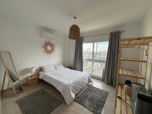 Ένα ή περισσότερα κρεβάτια σε δωμάτιο στο Elite Residence by the LOFT