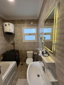 Ένα μπάνιο στο Elite Residence by the LOFT