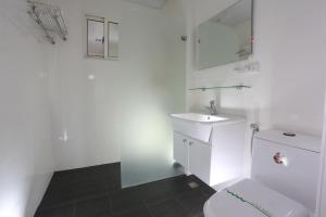 Koupelna v ubytování Guo Chen Hotel