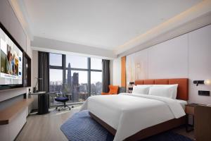 โทรทัศน์และ/หรือระบบความบันเทิงของ Hampton by Hilton Shenzhen Futian Huaqiangbei