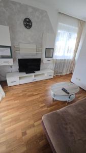 TV a/nebo společenská místnost v ubytování Apartment Dolina 8a Kärnten KLagenfurt