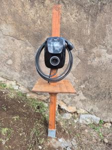 a camera on a wooden stand on the ground at Corte Degli Ulivi Resort in Vico Equense