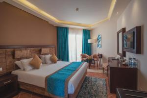 Voodi või voodid majutusasutuse Ivy Cyrene Sharm Resort Adults Friendly Plus 13 toas