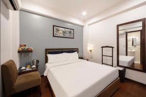 Ένα ή περισσότερα κρεβάτια σε δωμάτιο στο A25 Hotel - 30 An Dương