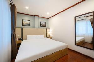 Ένα ή περισσότερα κρεβάτια σε δωμάτιο στο A25 Hotel - 30 An Dương