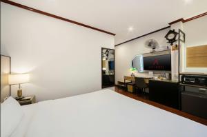 Ένα ή περισσότερα κρεβάτια σε δωμάτιο στο A25 Hotel - 30 An Dương