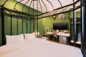 Ένα ή περισσότερα κρεβάτια σε δωμάτιο στο A25 Hotel - 30 An Dương