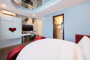 Μια τηλεόραση ή/και κέντρο ψυχαγωγίας στο A25 Hotel - 30 An Dương