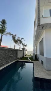 Πισίνα στο ή κοντά στο Villa Magnolia Meknès Oasis de paix pour famille