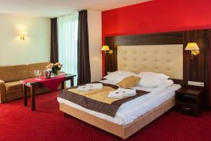
Łóżko lub łóżka w pokoju w obiekcie Hotel Pikul
