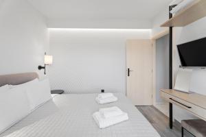 Posteľ alebo postele v izbe v ubytovaní Frunze Luxury Apartments