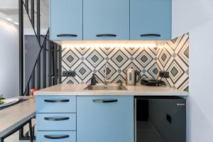 Kuchyňa alebo kuchynka v ubytovaní Frunze Luxury Apartments