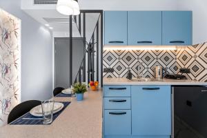 Kuchyňa alebo kuchynka v ubytovaní Frunze Luxury Apartments
