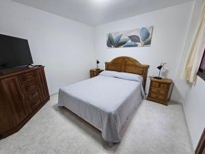 Ένα ή περισσότερα κρεβάτια σε δωμάτιο στο Casa Ulla