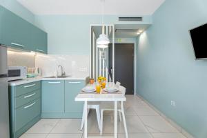 Kuchyňa alebo kuchynka v ubytovaní Frunze Luxury Apartments