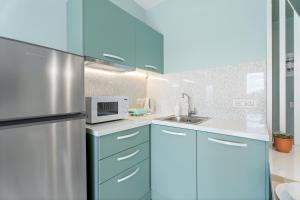 Kuchyňa alebo kuchynka v ubytovaní Frunze Luxury Apartments