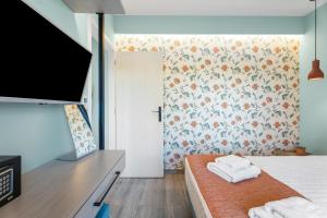 Posteľ alebo postele v izbe v ubytovaní Frunze Luxury Apartments