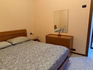 Postel nebo postele na pokoji v ubytování Ta maison e Ta maison oro