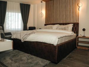 Postel nebo postele na pokoji v ubytování Hotel Europa 92