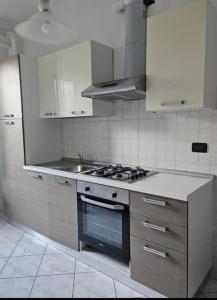 Kuchyň nebo kuchyňský kout v ubytování Agrati Residence