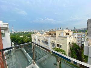 a view of the city from the balcony of a building at Hotel Park Hyatt in Dhaka