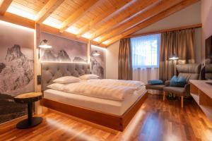 Postel nebo postele na pokoji v ubytování Boutiquehotel Grandau