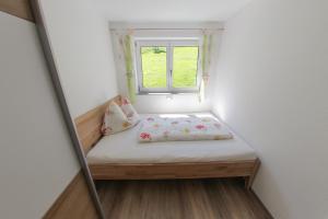 Posteľ alebo postele v izbe v ubytovaní Appartement Premsteingut