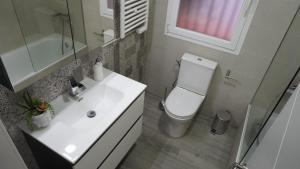 Koupelna v ubytování Casa Alpha