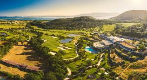 an aerial view of the golf course at the resort at Agriturismo Ristorante Monte Argentario in Monte Argentario