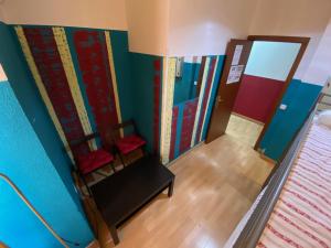 A bed or beds in a room at Bed Madrid Rooms by Bossh! Hotels