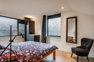 Postel nebo postele na pokoji v ubytování Easy Sleep Lelystad + 10 fotografií