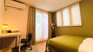 Letto o letti in una camera di Home Stroy in Tokyo - Luxury Villa Minowa&Ueno-三ノ輪一戸建て&東京屋語