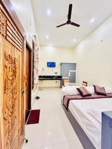 Giường trong phòng chung tại Hotel Central