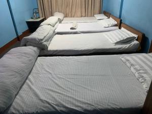 Postel nebo postele na pokoji v ubytování Hotel Sports Pvt Ltd