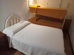 Postel nebo postele na pokoji v ubytování Lo de lu