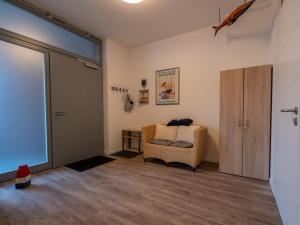 Un pat sau paturi într-o cameră la 145 Meerblick Ferienwohnung