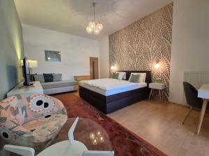 Postel nebo postele na pokoji v ubytování Penzion PIANO & Apartment Sokolov