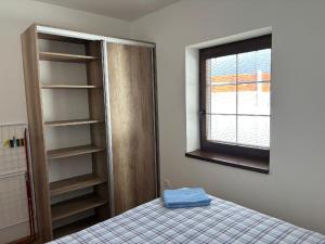 Posteľ alebo postele v izbe v ubytovaní Apartmán u Hovorků