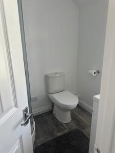 a bathroom with a white toilet in a room at Studio - Sleeps 2 - Pets - Parking - Wifi in York