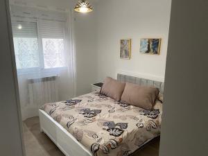 Ένα ή περισσότερα κρεβάτια σε δωμάτιο στο Beautiful Modern Style house