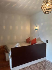 Ein Bett oder Betten in einem Zimmer der Unterkunft Villa Puerto Blanco