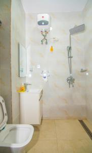 Koupelna v ubytování Purple Lavender Hotel Lekki