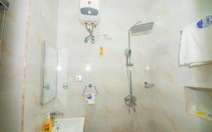 Koupelna v ubytování Purple Lavender Hotel Lekki
