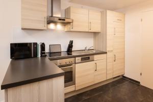 Køkken eller tekøkken på FeWo-Bergromantik mit Sauna und Pool