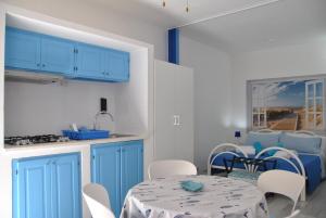 A kitchen or kitchenette at Casa Vacanze Casti - 41