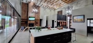 a kitchen with a island in a room at Golden Treasure - OFF GRID in eMalahleni