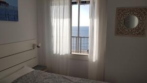 Posteľ alebo postele v izbe v ubytovaní Primera linea - Descanso Sol y Mar