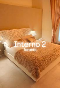 Interno2 객실 침대